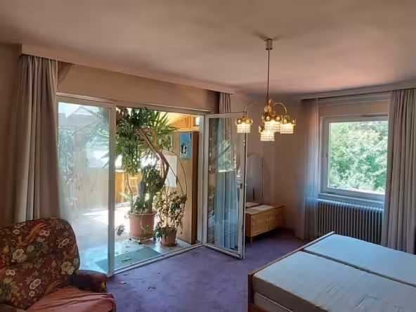 Schlafzimmer mit Wintergarten